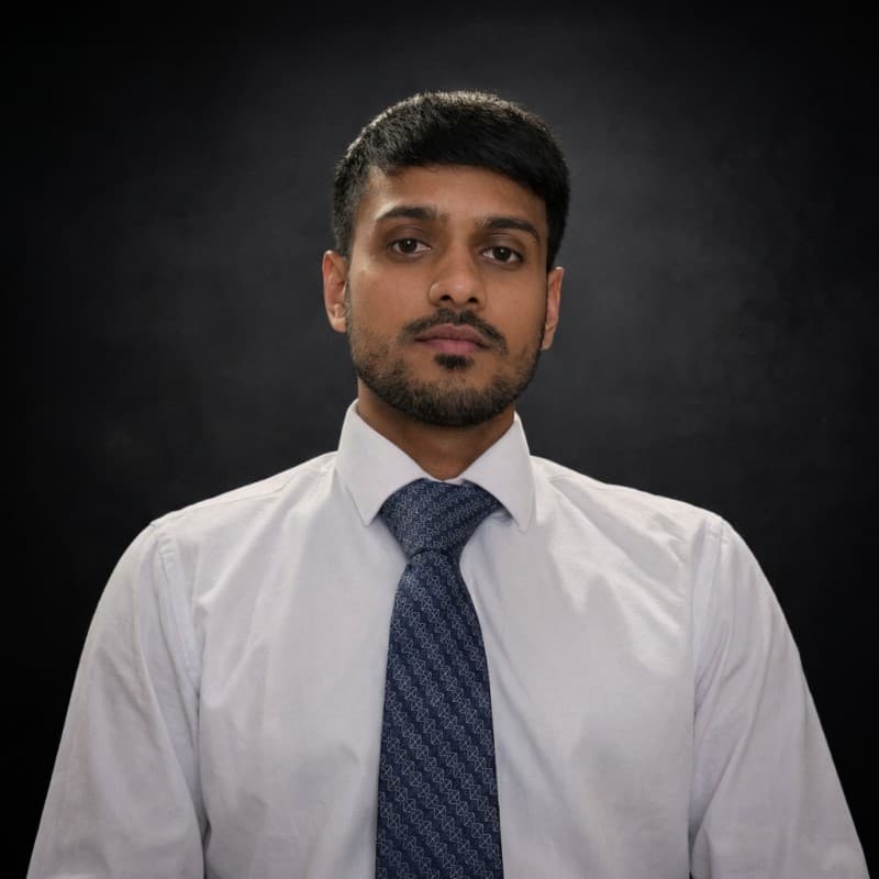 Tushar Laad, photographed against a dark background